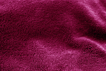 Sack cloth texture with blur effect in pink color.