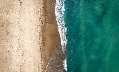 Aerial view of summer beach with ocean and free space for your decoration. Summer time