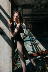 photo session with a young girl in a ruined building
