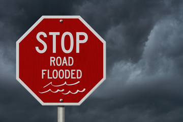 Stop road flooded red USA road sign