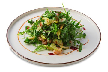 Salad with shrimps, arugula, cucumber, cheese and balsamic sauce isolated on white