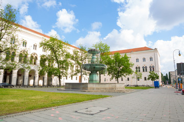 Scholl Siblings Plaza and the main building of the Ludwig Maximilian University in Munich, Germany...