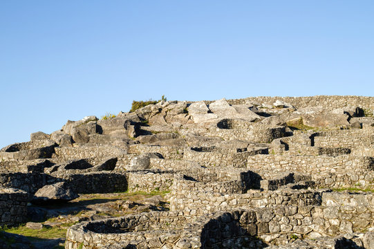 Ancient stone structures in Castro de Santa Trega, Galicia, Spain