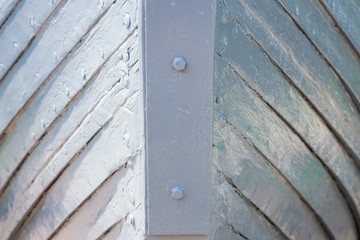 The bow of an old wooden ship.