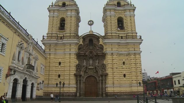 Steady, exterior, medium wide shot of the Monastery of San Francisco in Lima, Peru.