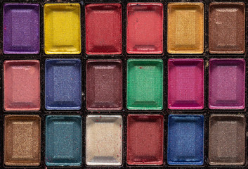 Colorful eye shadows palette. Makeup background. close up