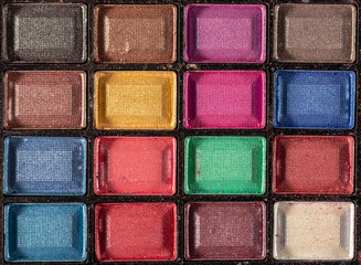 Colorful eye shadows palette. Makeup background. close up