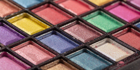 Colorful eye shadows palette. Makeup background. close up