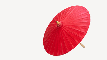 The red umbrella that cuts the background makes the background white.