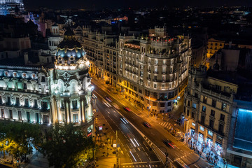 Fototapeta na wymiar Madrid, Spain, Night View of Landmark Buildings on Gran Via Street
