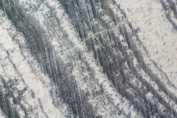 Texture of natural mineral skarn with marks of polishing macro