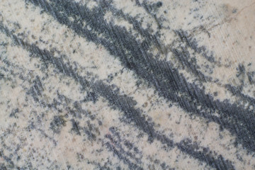Texture of natural mineral skarn with marks of polishing macro