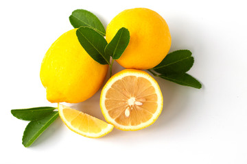 fresh lemon with lime and leaves on white background