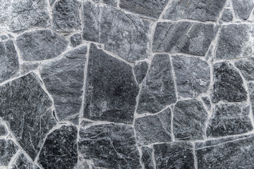 Rough granite background. Background texture of stone wall.