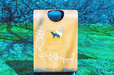 Recycling Bin on Green Background