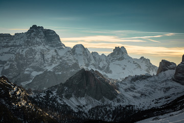 view on scenic snowy mountain range landscape in sunlight, view from monte piana in dolomites, italy