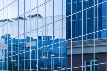 Fototapeta na wymiar high-tech citysсape, fragment of glass and metal building facades