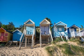 Fototapeta na wymiar Medium Close up of Beach Huts in Norfolk