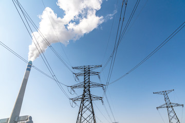 High voltage pole with power station
