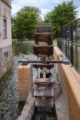 Fototapeta na wymiar Schaufelrad einer Wassermühle