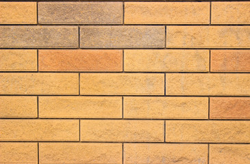  Multi-colored brickwork in yellow-brown tones.