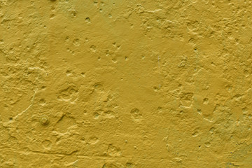  metal surface painted in yellow with texture. background