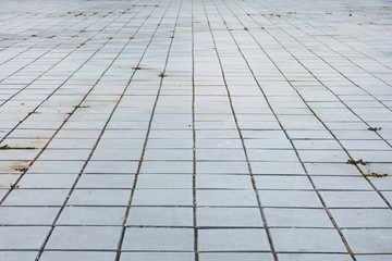 Cement blocks are paved on the ground