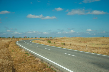Road through rural landscape near the Monfrague National Park