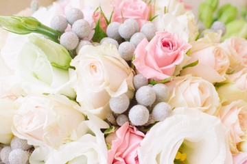 Background of a bouquet of roses and eustoma, macro, close up.