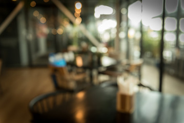 Fototapeta na wymiar abstract light bokeh background in blur restaurant