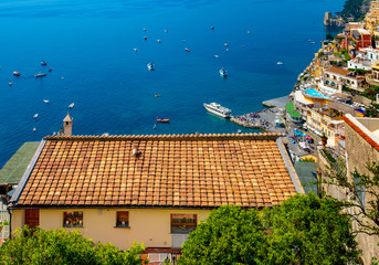 View of beach and colorful buildings  in Positano town  at  Amalfi Coast, Italy.