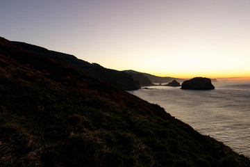 landscape of gaztelugatxe at sunset