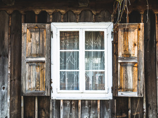 Old wooden windows in a rural hut