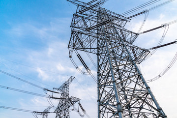 power transmission tower on background of blue sky