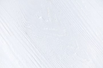 White textured wood background. Empty wooden backdrop with rough surface. Blank wooden backdrop with grungy natural wood plank. Wooden table with a beautiful structure painted in white 