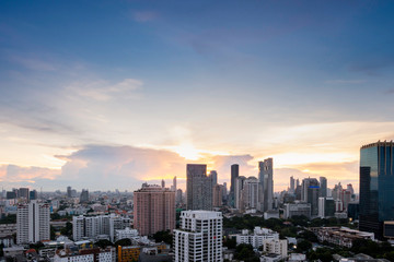 Fototapeta na wymiar sunset sky cityscape of Bangkok city skyline with background, Bangkok city is modern metropolis of Thailand and favorite of tourists