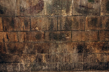 Pavement texture. An old stoneblock pavement cobbled with square granite blocks. Urban Pavement Surface
