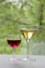 Vintage glass goblet on green background