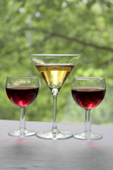 Vintage glass goblet on green background