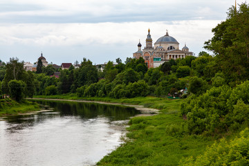 Fototapeta na wymiar Scenic view of the Tvertsa River and Boris-Gleb Monastery in Torzhok (Russia)