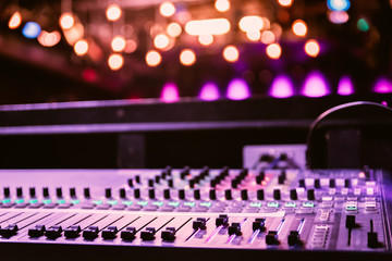 Sound recording studio mixer desk at a concert: professional music recording