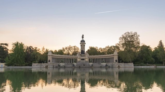 Madrid Spain time lapse 4K, city skyline sunrise timelapse at El Retiro Park