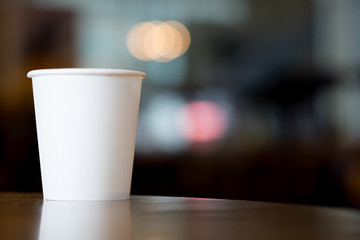 White disposable paper cup for drink water