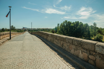 Pavement made of setts on top of Roman bridge int Merida