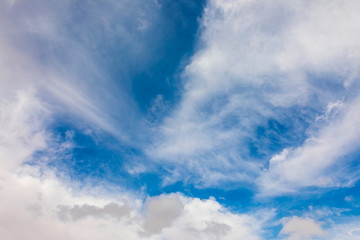 Dramatic blue sky with fluffy clouds at early morning