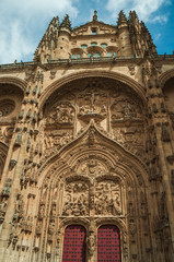Fototapeta na wymiar Facade with wooden door on the New Cathedral at Salamanca
