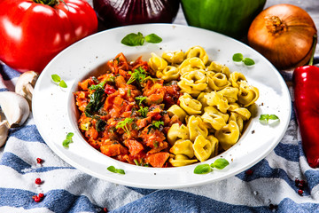 Tortellini with sausage and vegetables