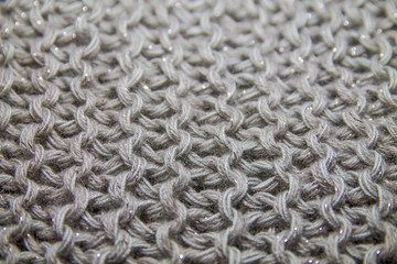 Perspective view of gray handmade knitted pattern background