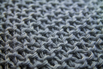 Perspective view of gray handmade knitted pattern background
