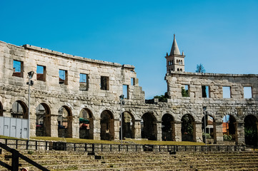 Fototapeta premium Pula, Croatia - June 10, 2019: Roman amphitheater in Pula, the best preserved ancient monument in Croatia, visited by hundreds of tourists.